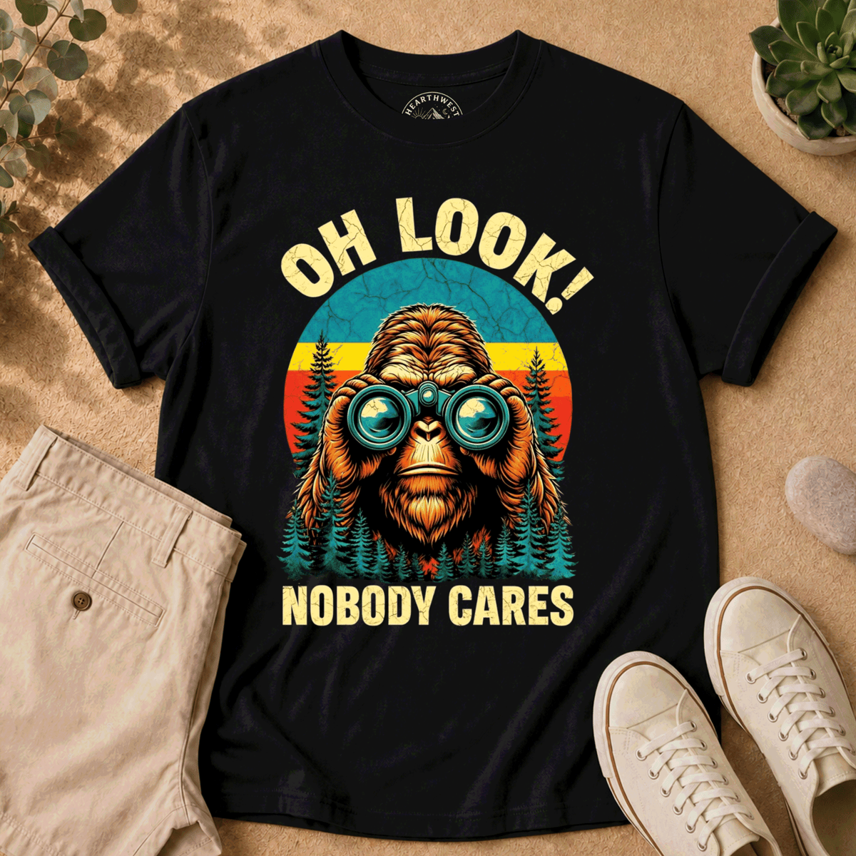 T-Shirt — "Oh Look! Nobody Cares" Retro Binoculars Sasquatch Tee