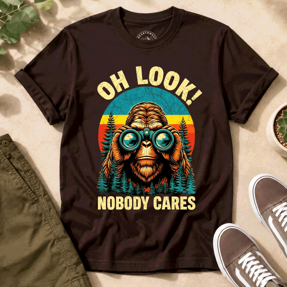 T-Shirt — "Oh Look! Nobody Cares" Retro Binoculars Sasquatch Tee