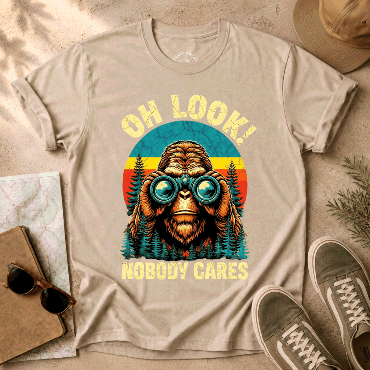 T-Shirt — "Oh Look! Nobody Cares" Retro Binoculars Sasquatch Tee