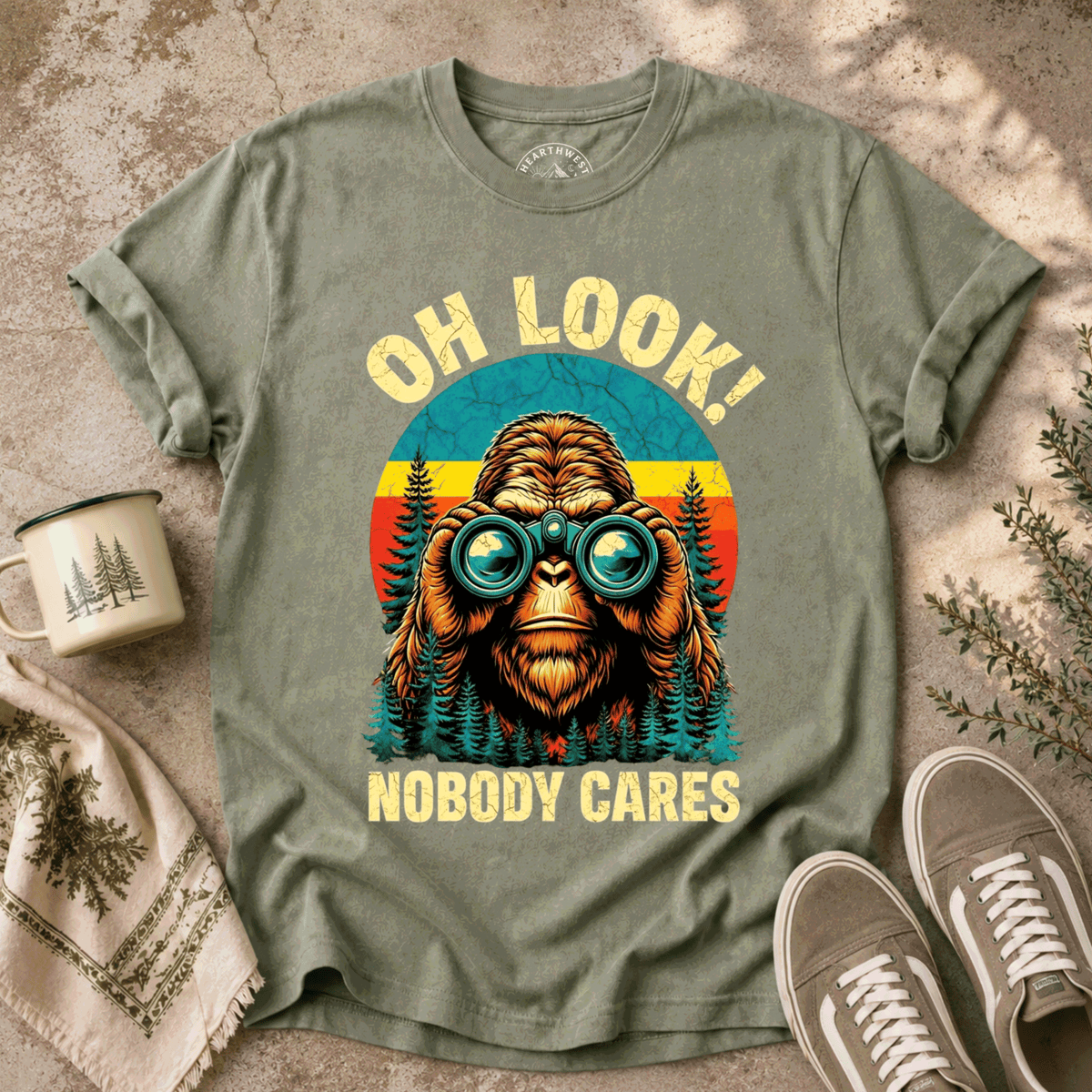 T-Shirt — "Oh Look! Nobody Cares" Retro Binoculars Sasquatch Tee