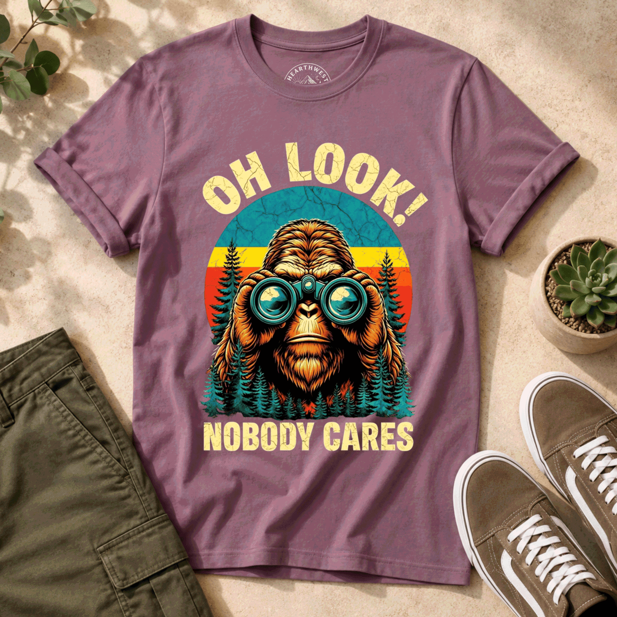 T-Shirt — "Oh Look! Nobody Cares" Retro Binoculars Sasquatch Tee